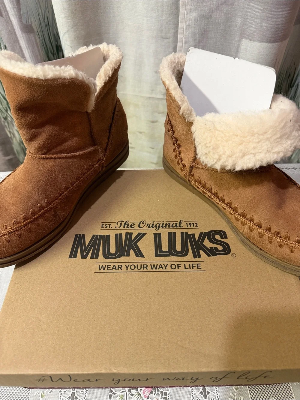 Woman’s Cozy Faux-Shearling Booties in Brown